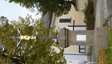 Pozlacená socha Ježíše